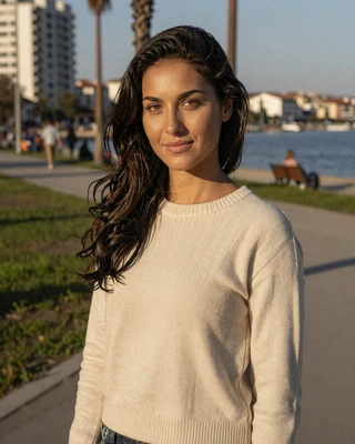 Yoana from Burgas in cream knit sweater in a seafront park