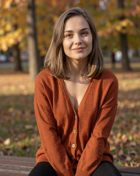 Polina from Yekaterinburg in rust cardigan in autumn park